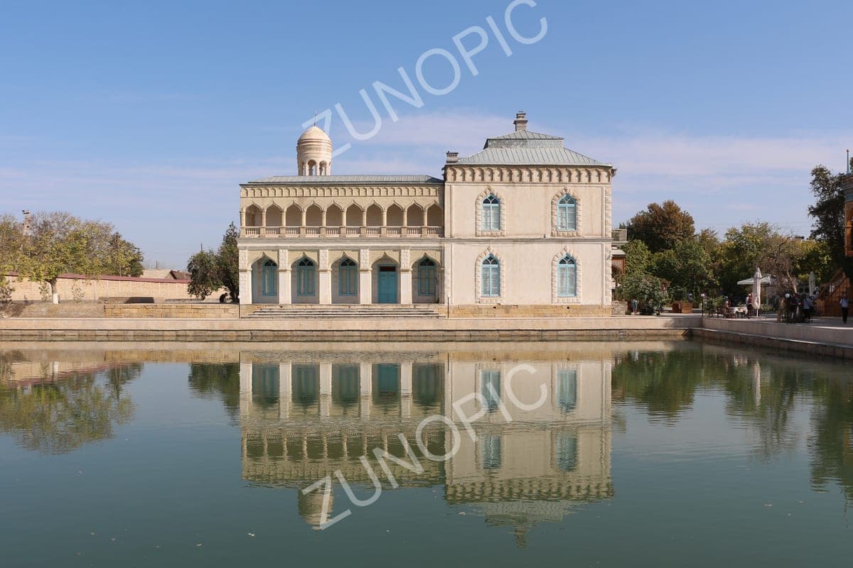 Palace pavilion reflected in a still pool