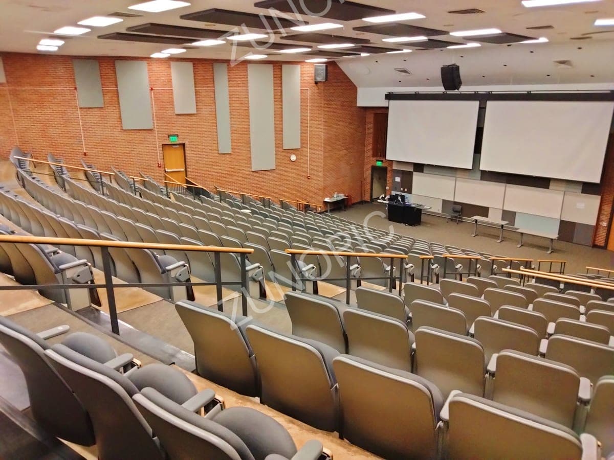 Empty university lecture hall with tiered seating